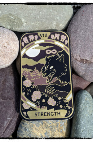 Sticker of the Strength tarot card, featuring a werewolf plucking at rose bushes, tucked on some red rocks that match the reddish-purple of the art