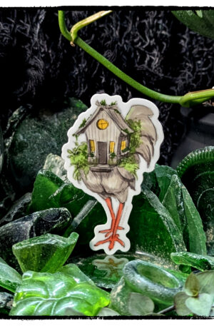 Sticker of Baba Yaga's chicken-legged cottage, posed on a treasure trove of green sea glass and kept company by live plants