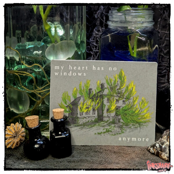 Sticker of a haunted house with foliage bursting through windows, posed with live plants in glass jars & witchy bottles