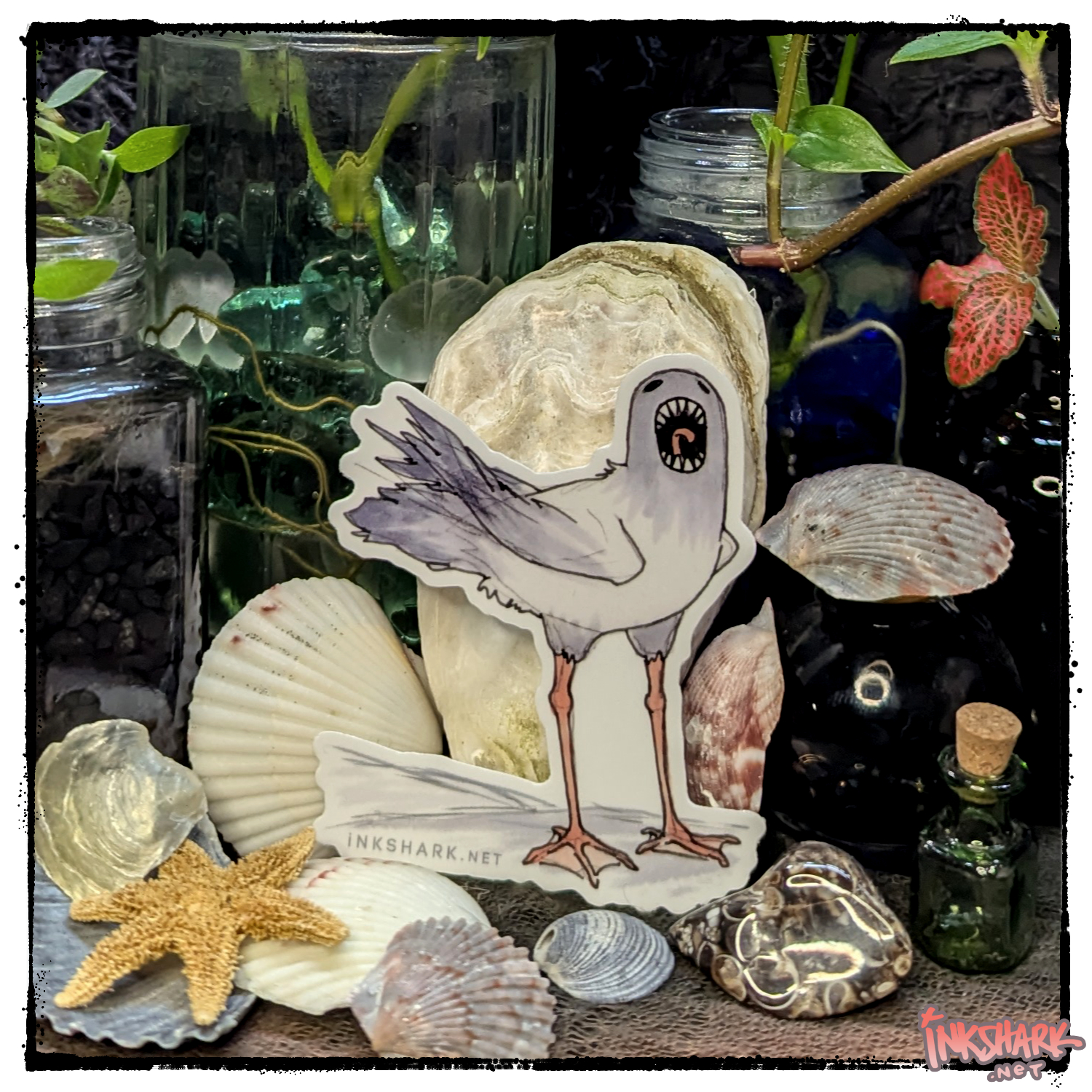 Sticker of a weirdo screaming seagull monster; product is posed among seashells and witchy jars